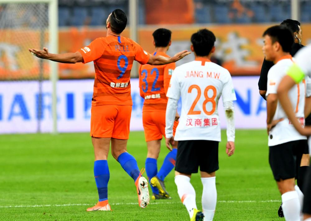 山东鲁能客场战胜河南建业，振作精神